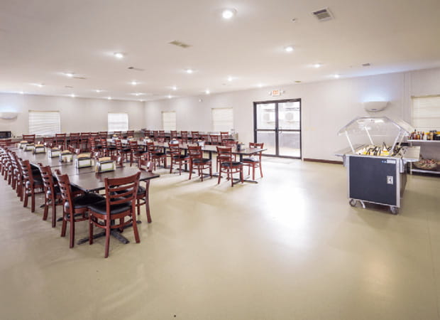 Cafeteria furnished with tables and chairs